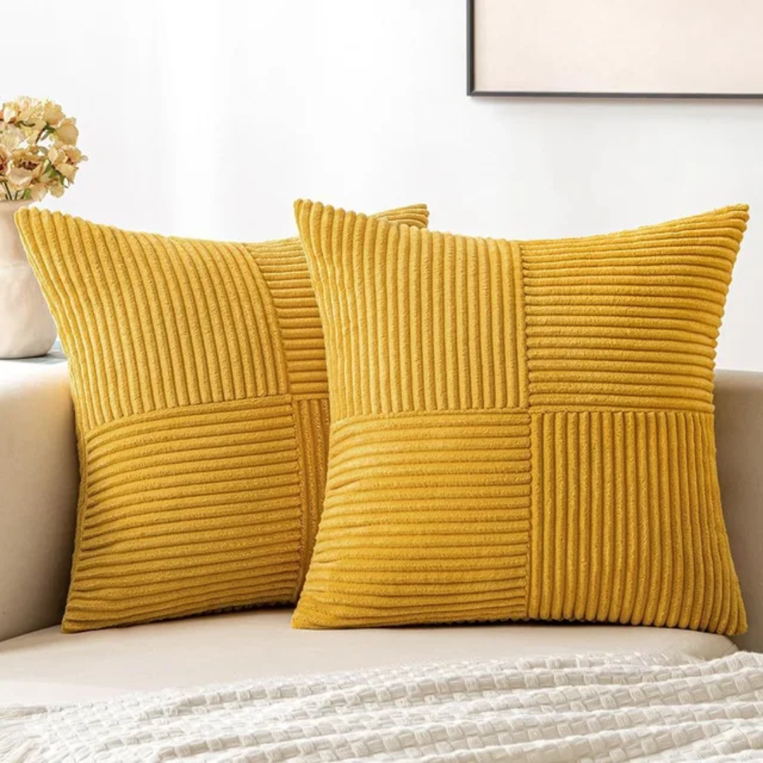 Cushion cover in dark grey on a chair