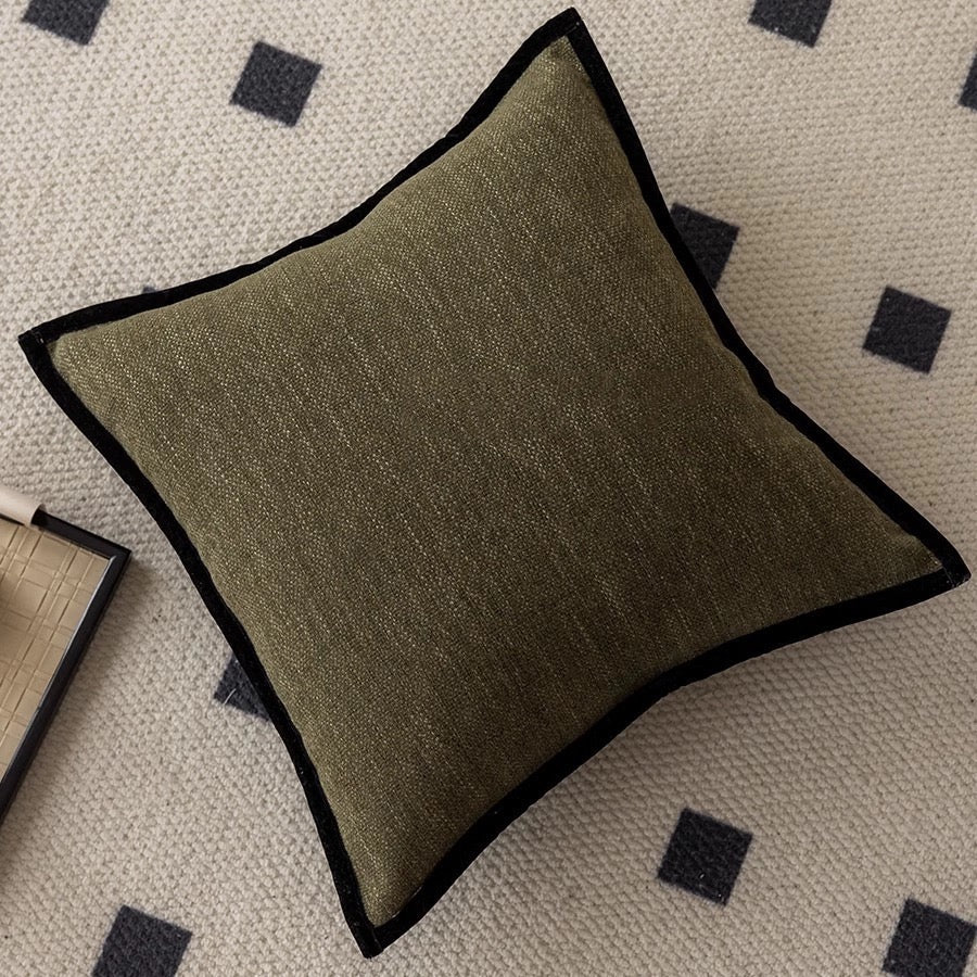 Black border cushion cover shown flat