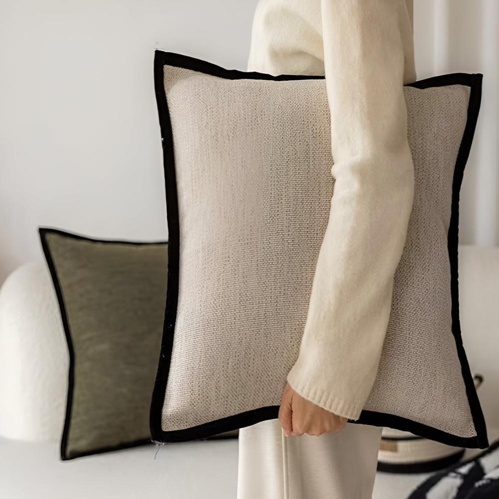 Two cushion covers styled together on a seat