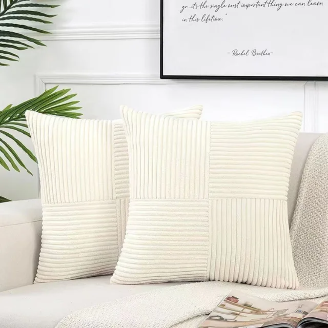 Cushion cover in beige on a sofa